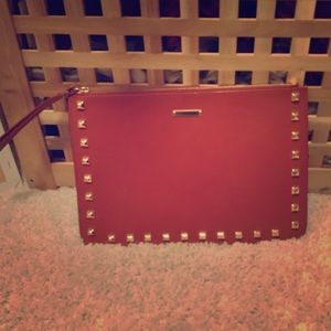 Brown leather clutch